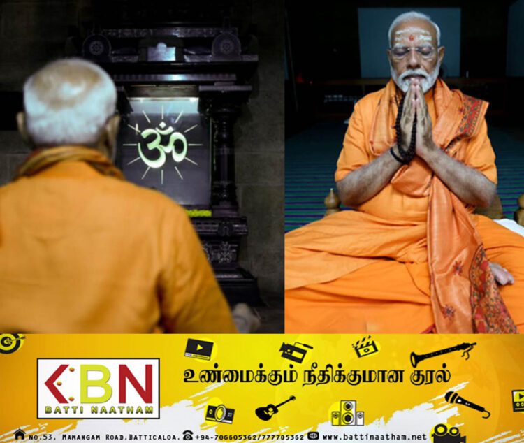 காவி உடையில் தியானம் செய்யும் மோடி!