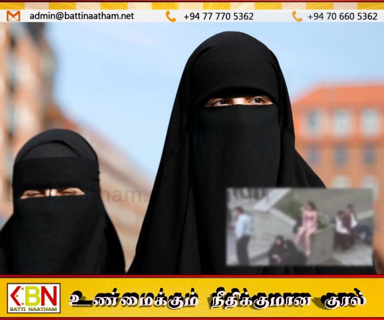 ஹிஜாப் சட்டத்துக்கு எதிர்ப்பு தெரிவித்து பல்கலைக்கழக வளாகத்துக்குள் ஆடைகளை கலைந்த பெண்