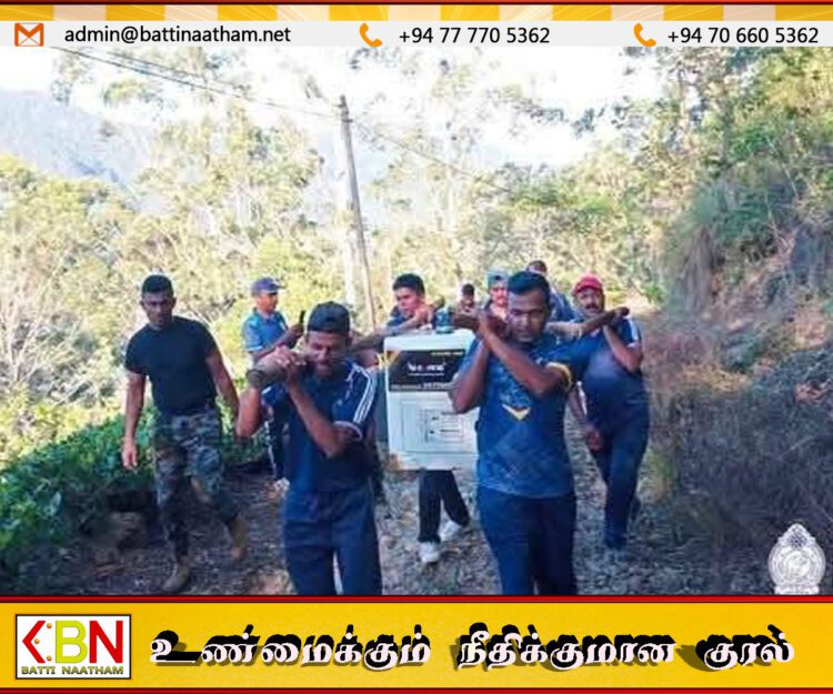 மலையடிவார கோபுரங்களை மீட்டெடுக்க ஜெனரேட்டர் சுமந்து செல்லும் பொலிஸார்