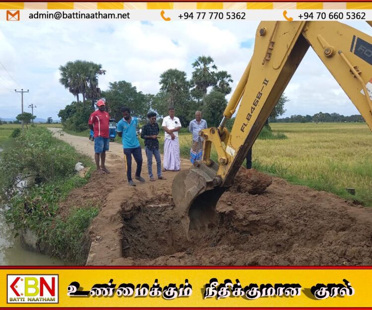 மட்டு நவகிரிகுளத்தின் வான் கதவுகள் 6 அடி திறப்பு; கிராமத்தின் ஒரே பாதை மீண்டும் தாளிறக்கம்